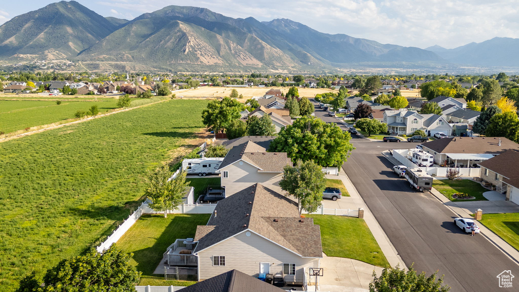 Aerial view of residential area with a mountainous background