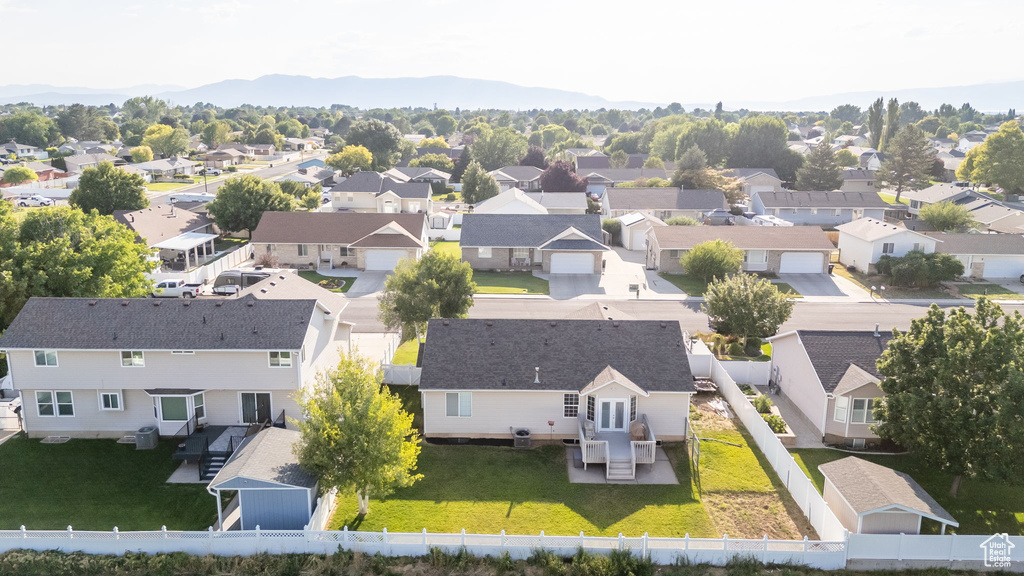 Aerial view of residential area with a mountainous background