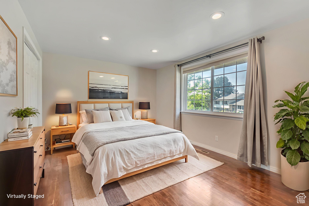 Bedroom featuring recessed lighting and wood finished floors