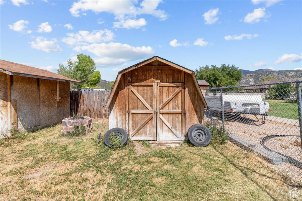 View of shed featuring a mountain view