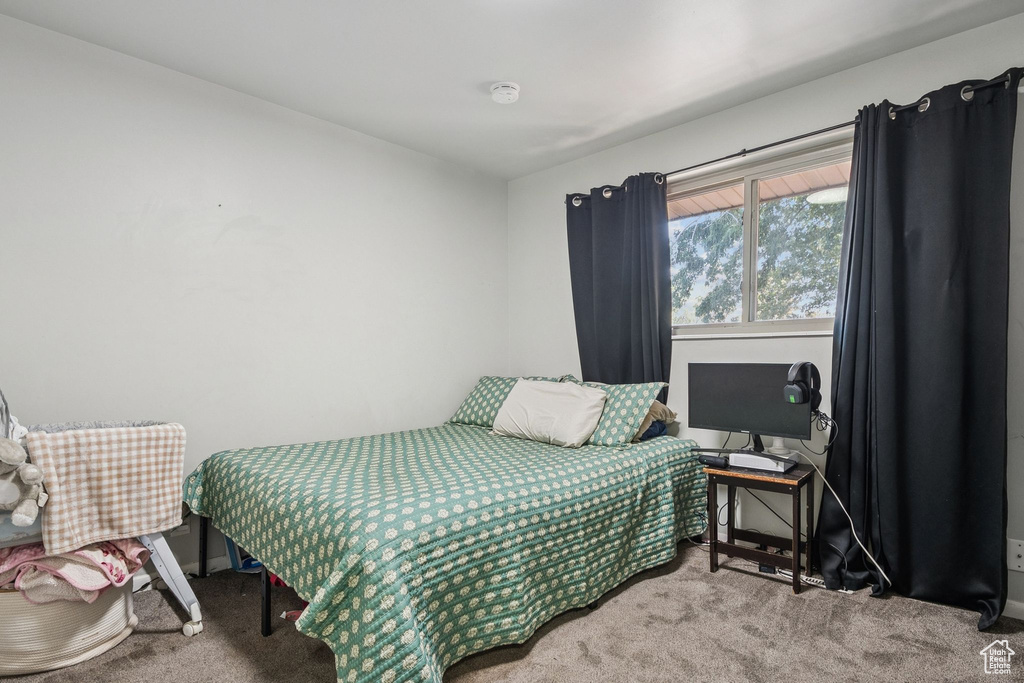 Bedroom featuring carpet flooring