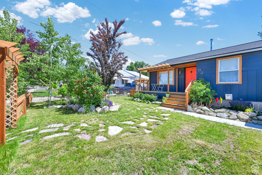 View of yard with a porch