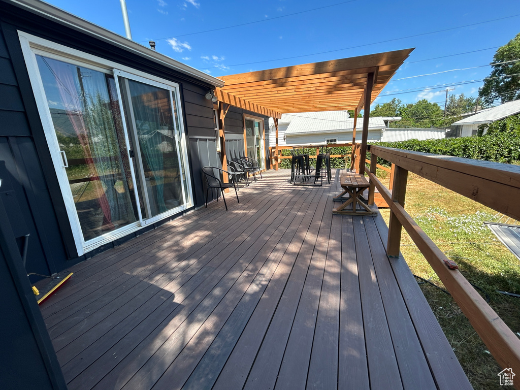 Wooden terrace with outdoor dining space