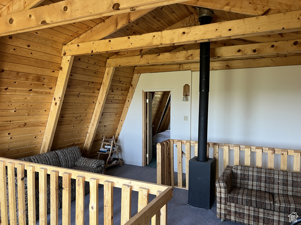 Carpeted bedroom with wooden ceiling