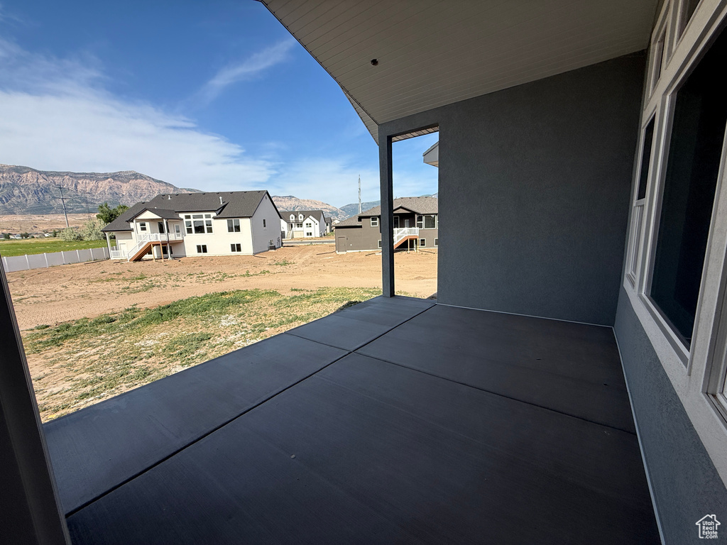 View of patio / terrace with a mountain view and a residential view