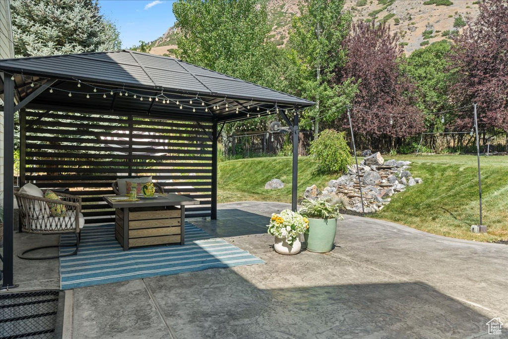 View of patio with a gazebo