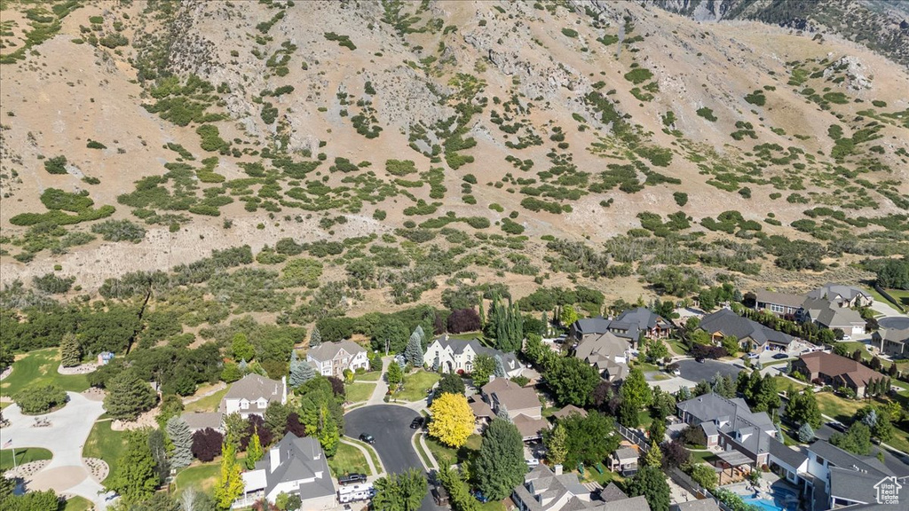 Aerial perspective of suburban area featuring a desert landscape