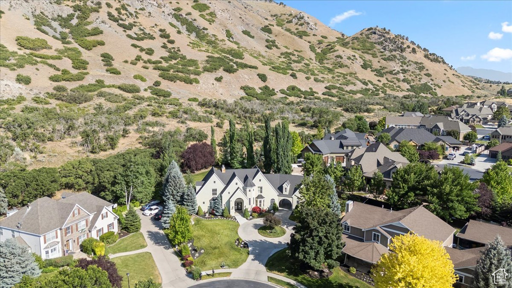 Aerial perspective of suburban area featuring mountains