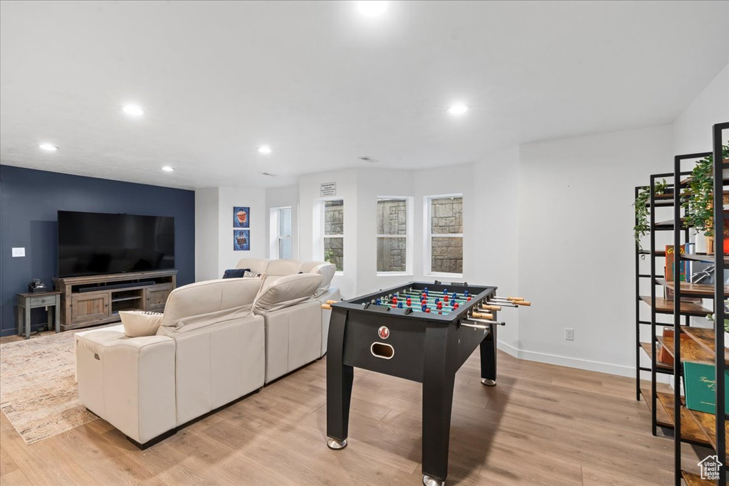Recreation room featuring recessed lighting and light wood-style flooring