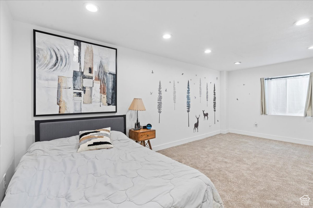Bedroom featuring recessed lighting and carpet flooring