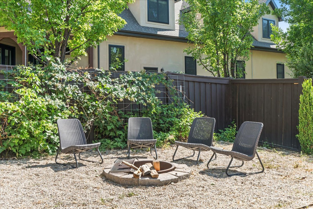 View of patio featuring an outdoor fire pit