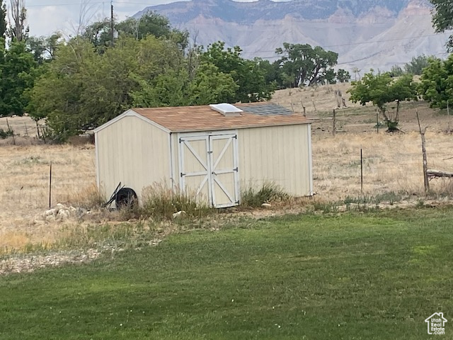 View of shed featuring a mountain view