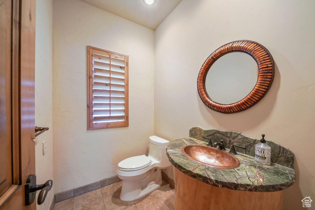 Bathroom with toilet and vanity