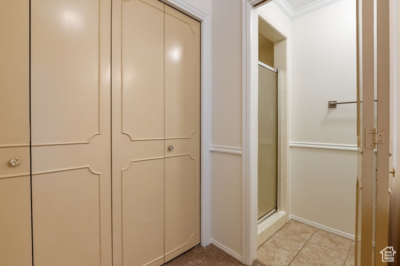 Bathroom with a shower with shower door