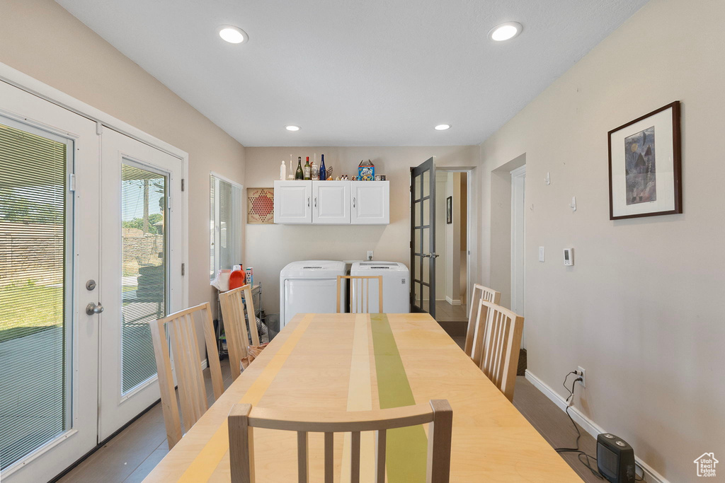 Dining space featuring french doors, recessed lighting, and separate washer and dryer