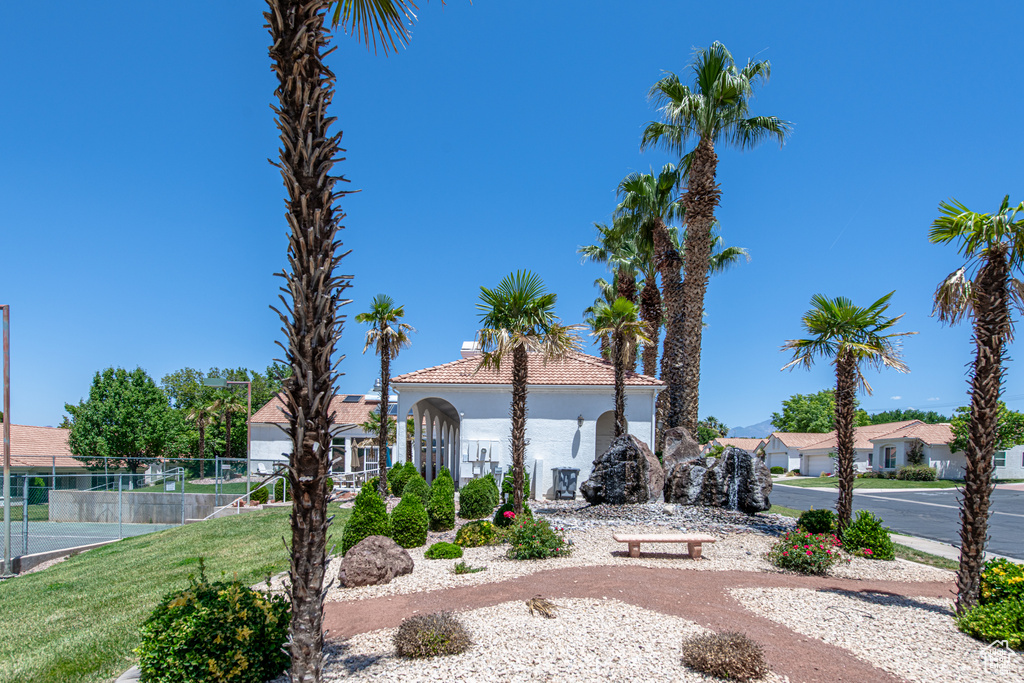 Mediterranean / spanish-style home with stucco siding and a tile roof