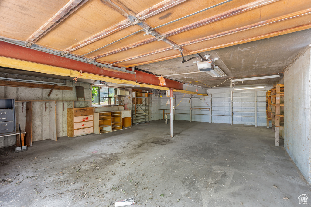 Garage featuring a garage door opener