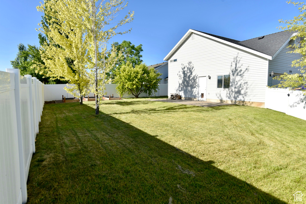 View of fenced backyard
