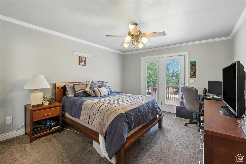 Bedroom with access to exterior, carpet floors, a desk, crown molding, and ceiling fan