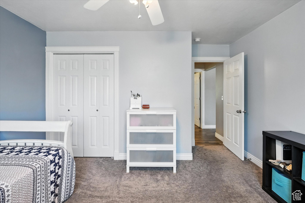 Bedroom featuring carpet, a closet, and ceiling fan