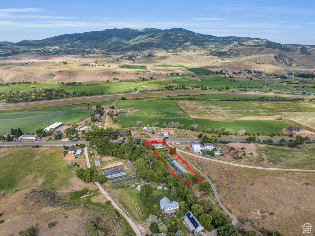 View of property location with property boundaries highlighted, rural landscape, and mountains