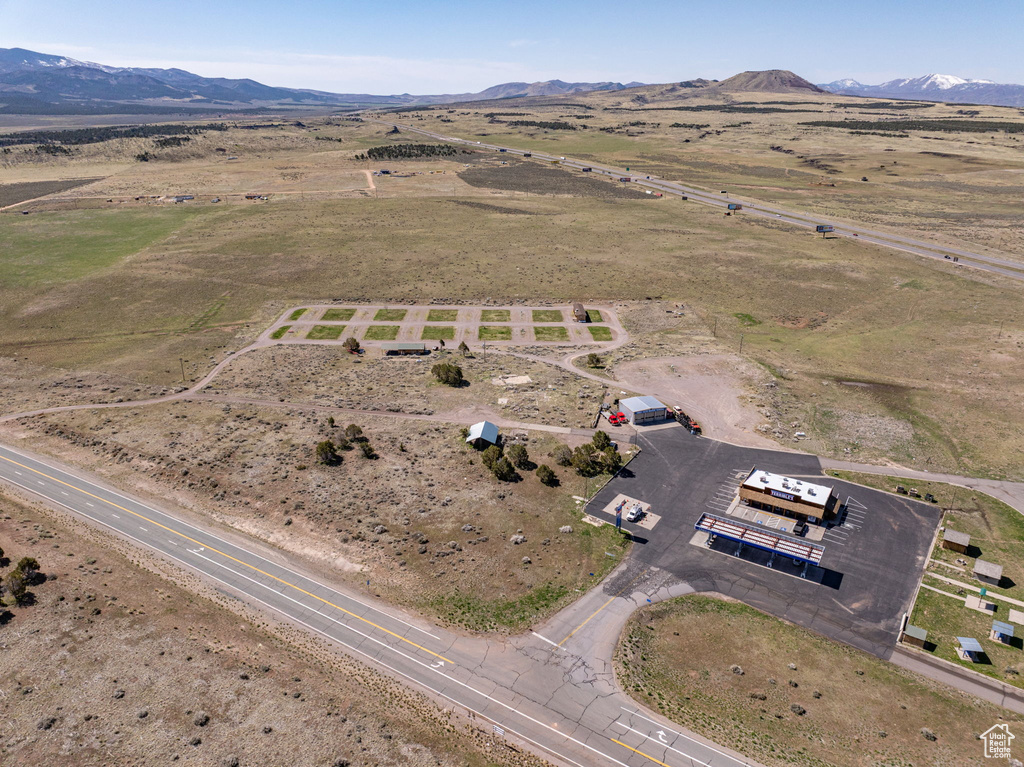 Aerial overview of property\\\\\\\\\\\\\\\'s location featuring a mountain backdrop and rural landscape