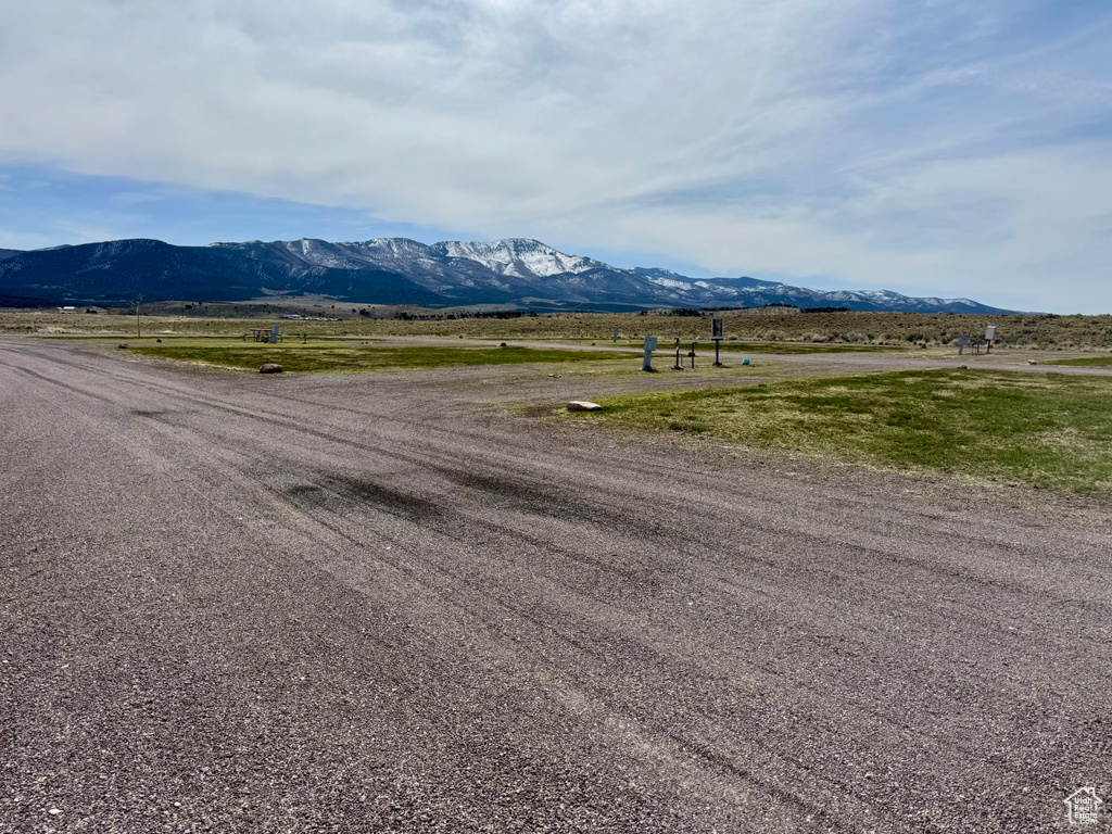 View of mountain background featuring rural landscape