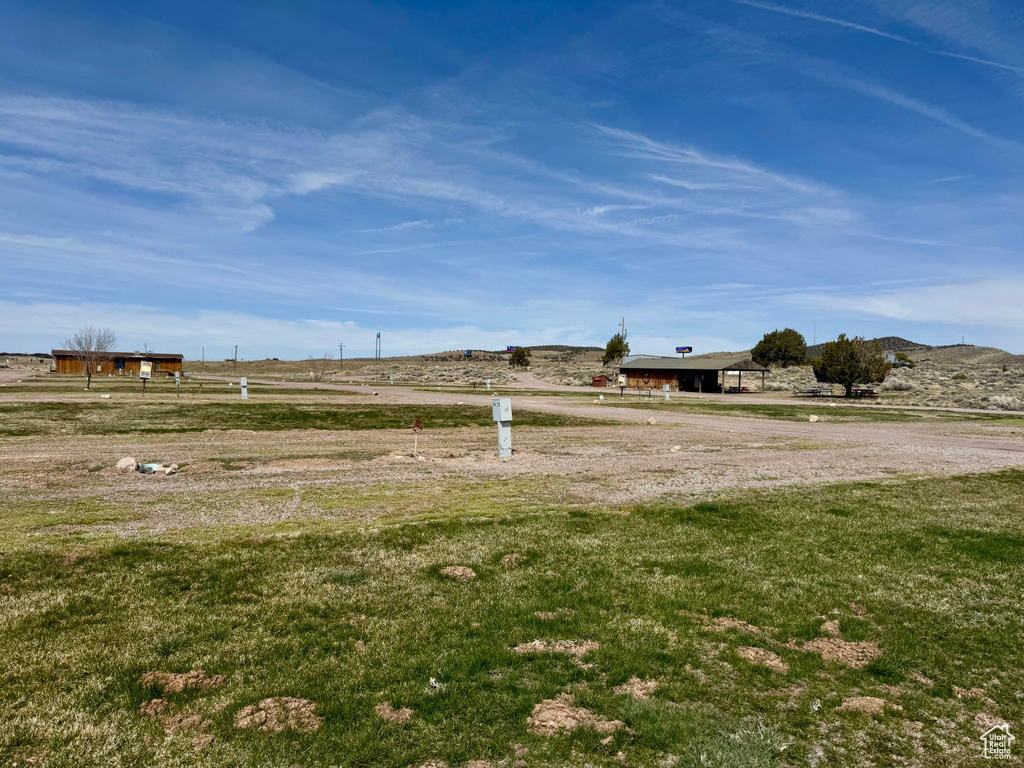 View of yard with a mountain view and a view of countryside