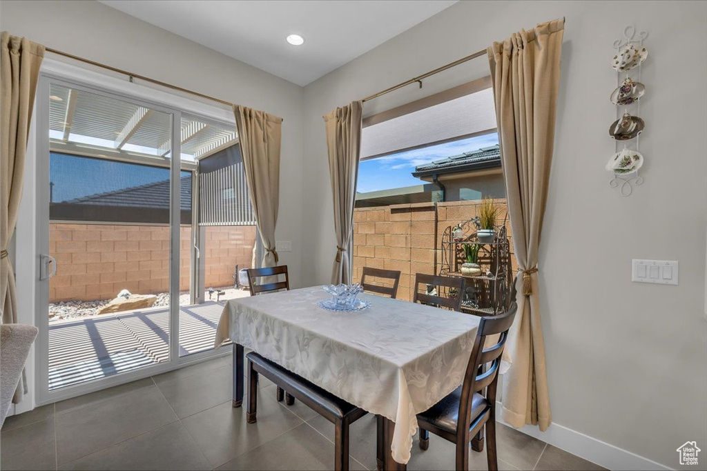 Tiled dining area with baseboards