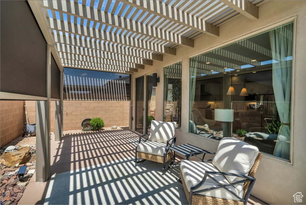 View of patio featuring a pergola
