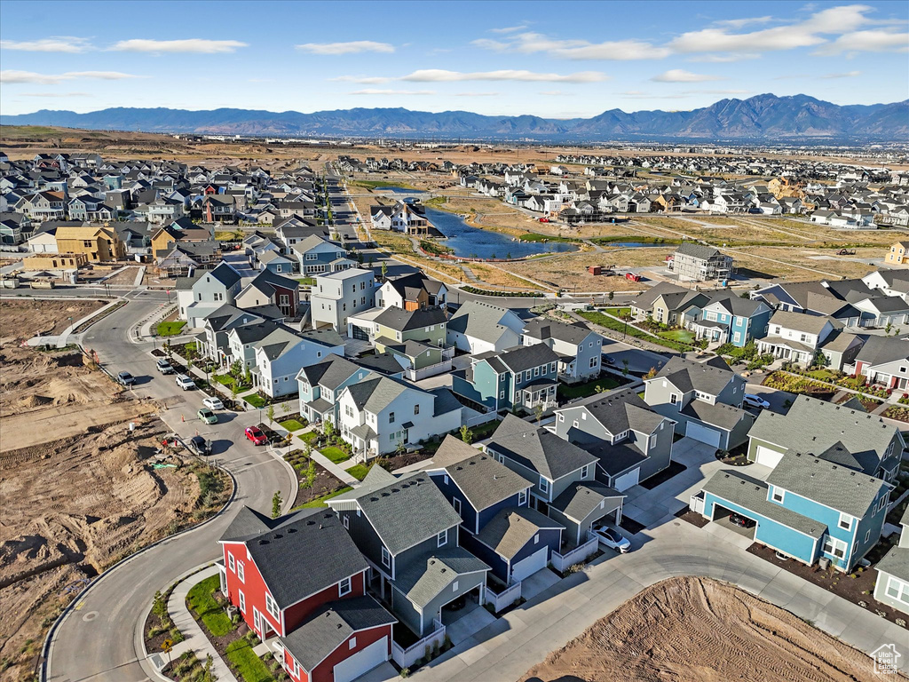 Aerial view of residential area with a mountain backdrop