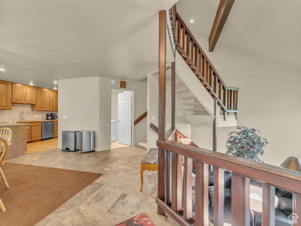 Staircase featuring recessed lighting