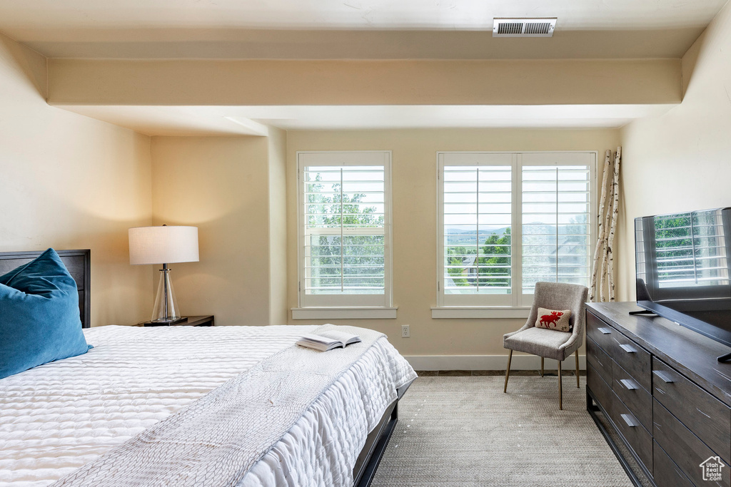 Bedroom featuring baseboards
