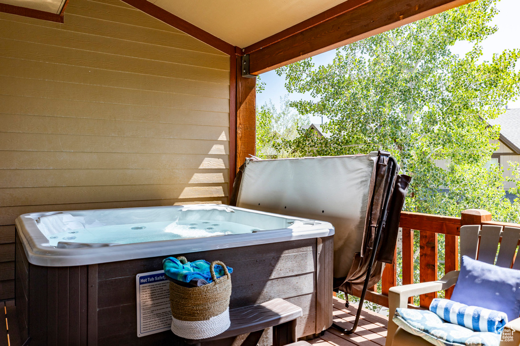 Deck featuring a hot tub
