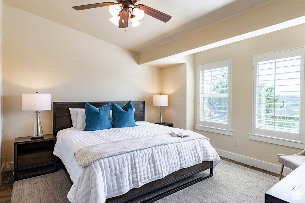 Bedroom featuring baseboards and a ceiling fan