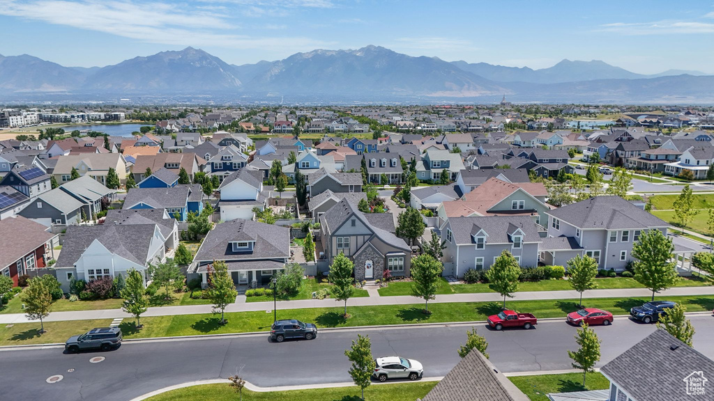 Aerial view of residential area featuring mountains