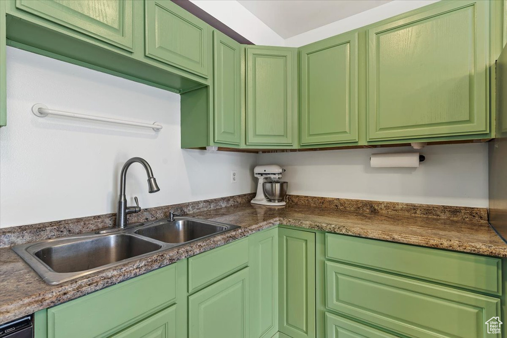 Kitchen with a sink and black dishwasher