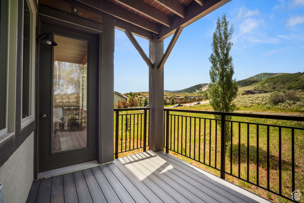 Wooden deck with a mountain view