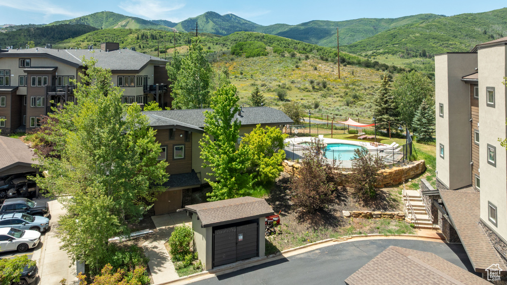 View of mountain background featuring nearby suburban area