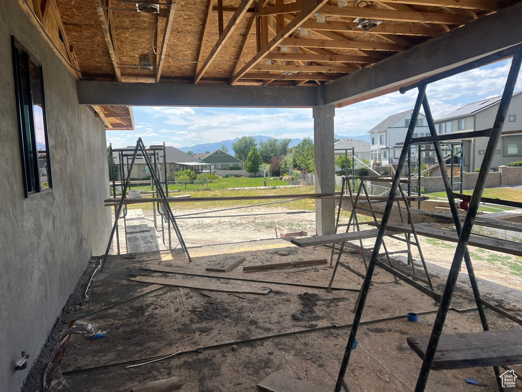 View of patio / terrace featuring an exterior structure, a residential view, and an outdoor structure