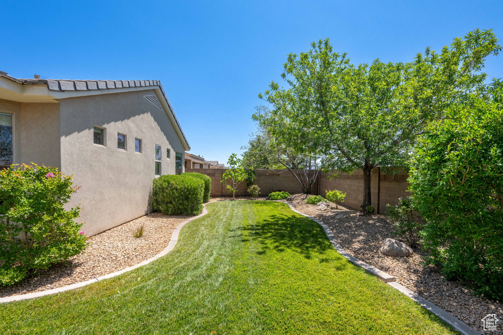 View of fenced backyard