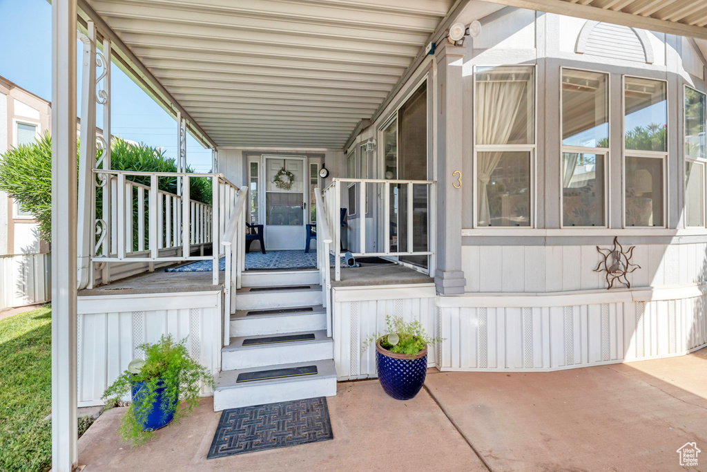 Property entrance featuring a porch