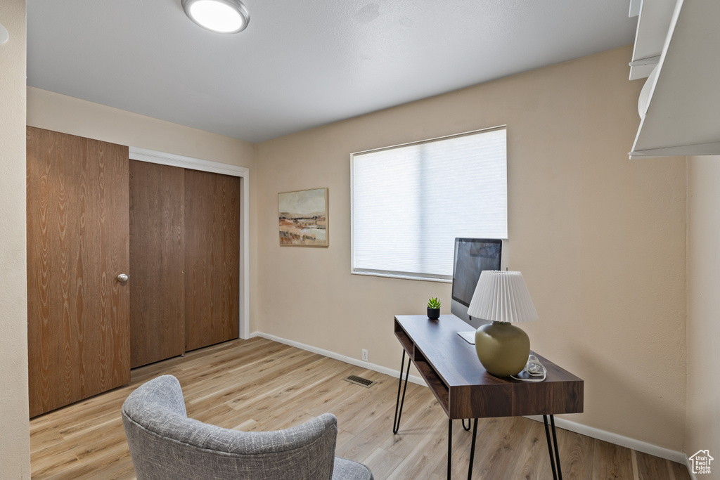 Office space with wood finished floors