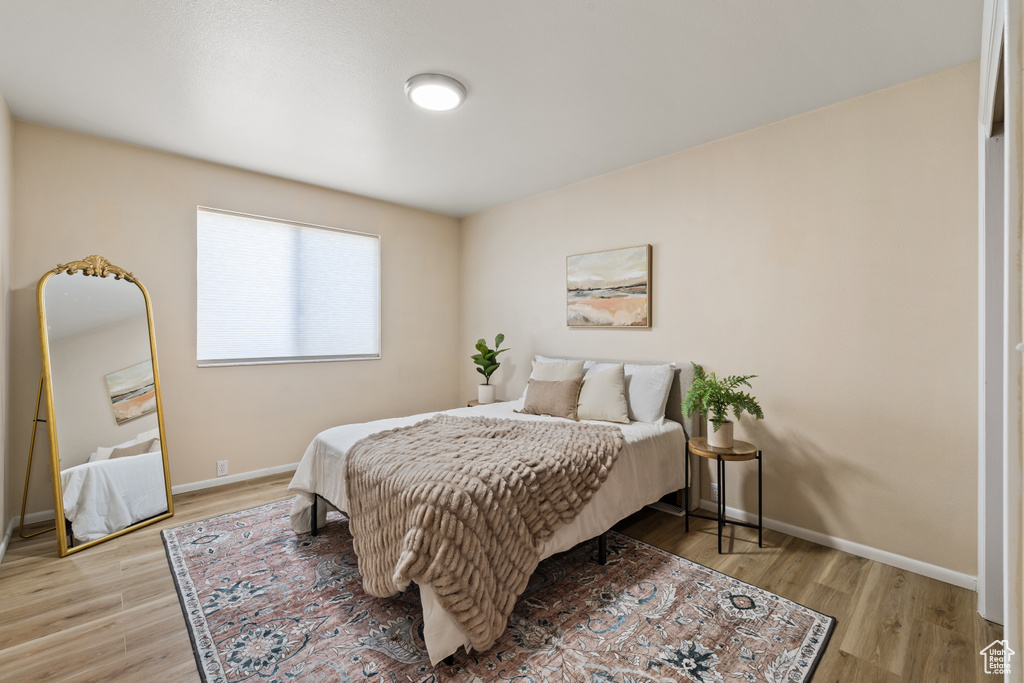Bedroom featuring light wood-style flooring