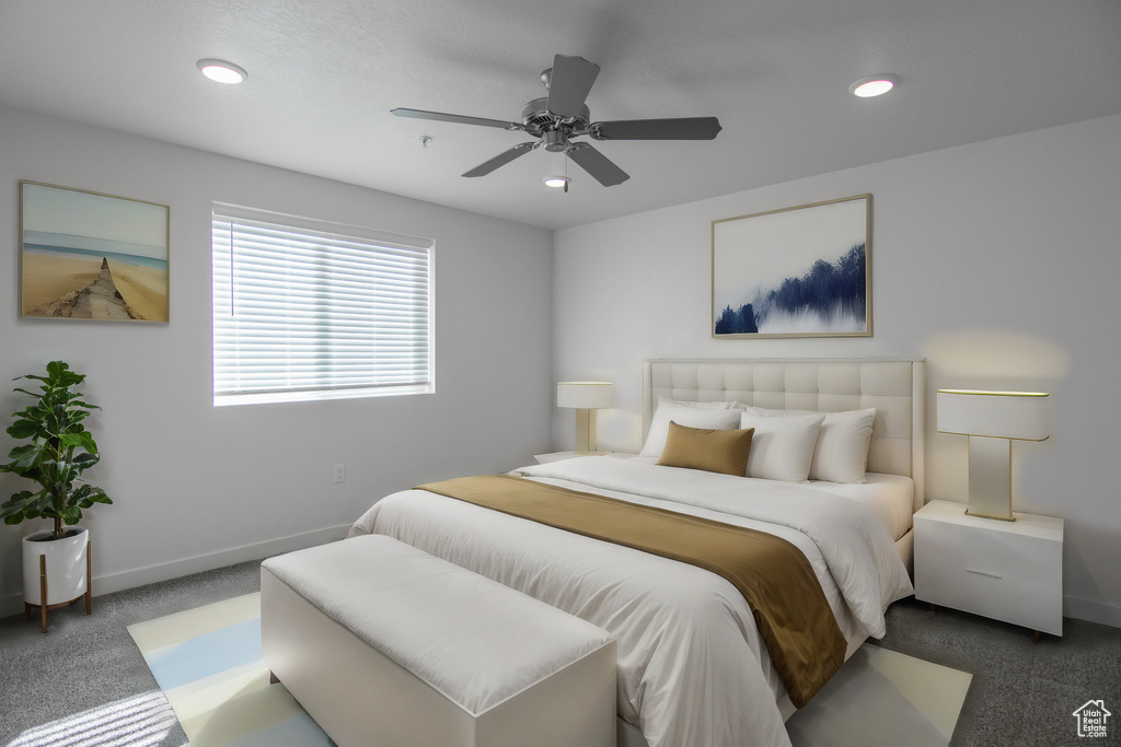 Carpeted bedroom featuring recessed lighting and ceiling fan