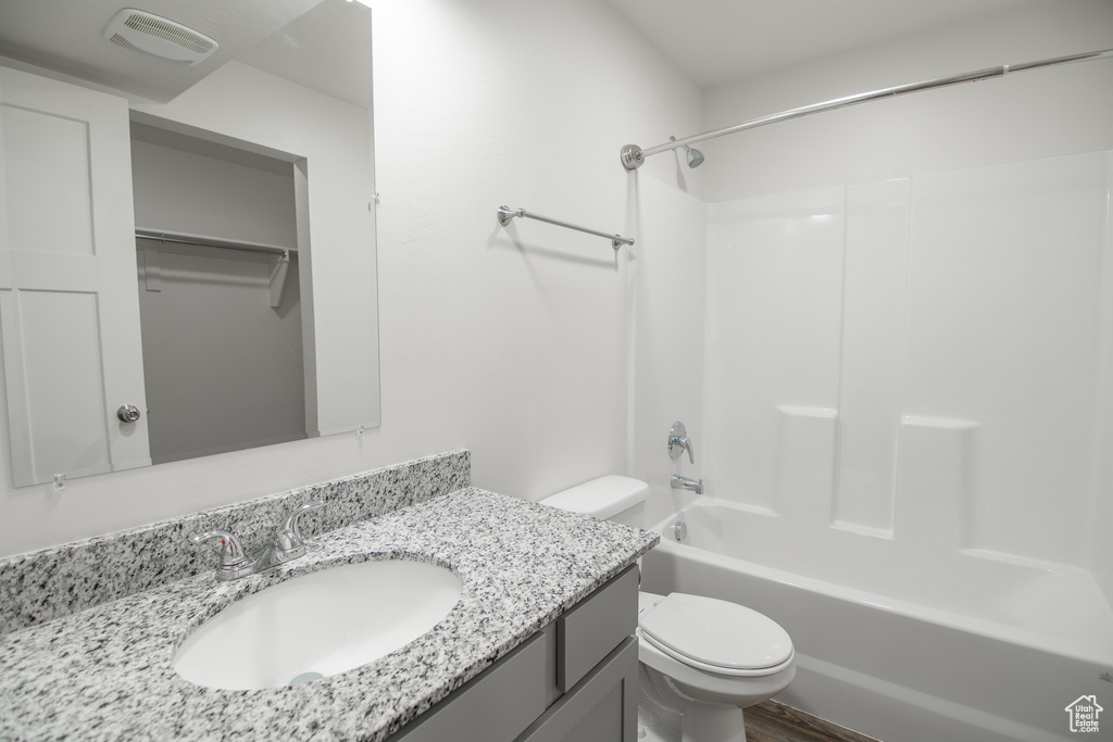Full bathroom with vanity and shower / tub combination