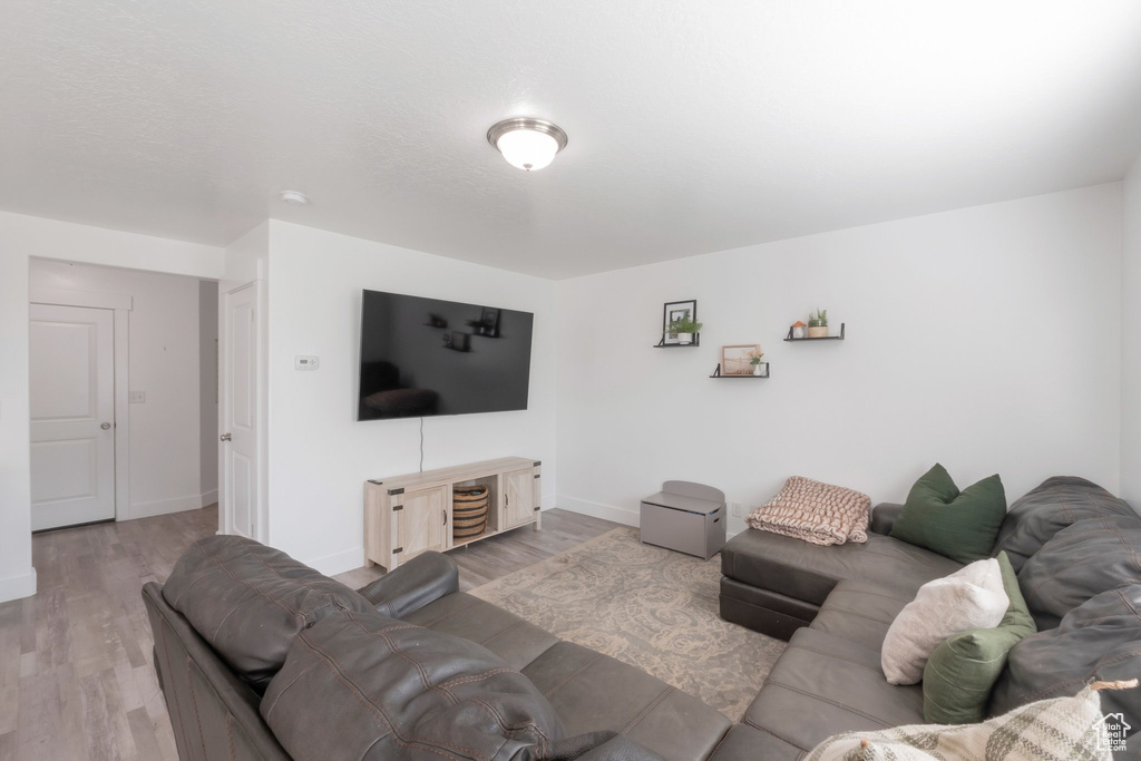 Living area with wood finished floors