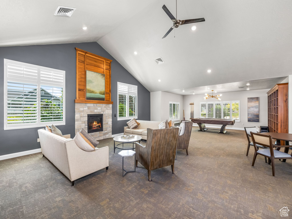 Living room featuring a stone fireplace, billiards table, healthy amount of natural light, carpet, and recessed lighting