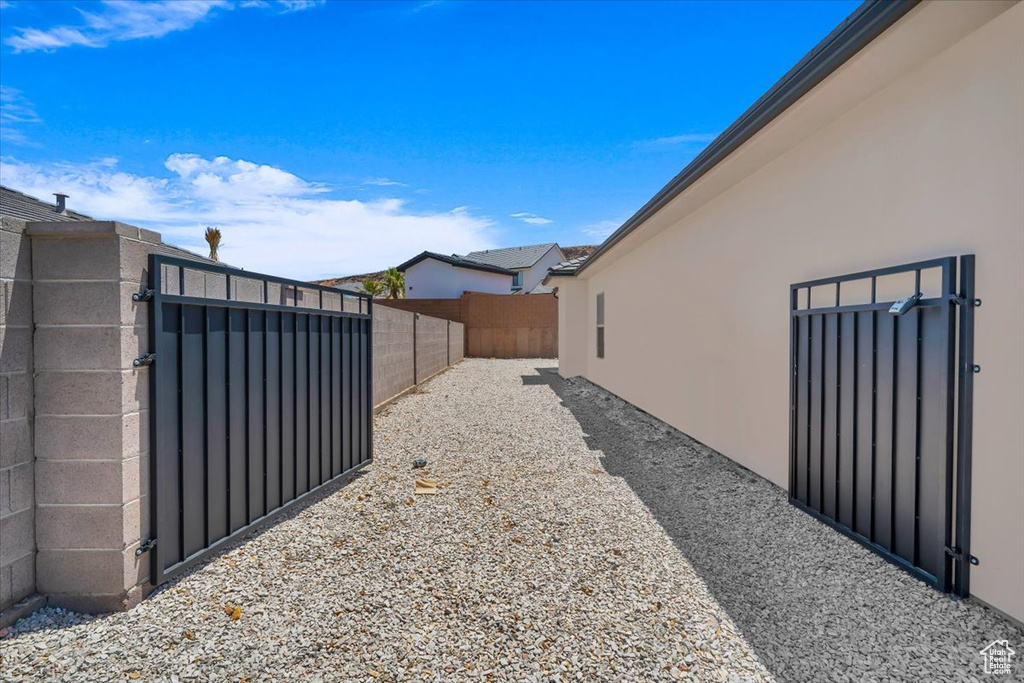 View of yard featuring a gate