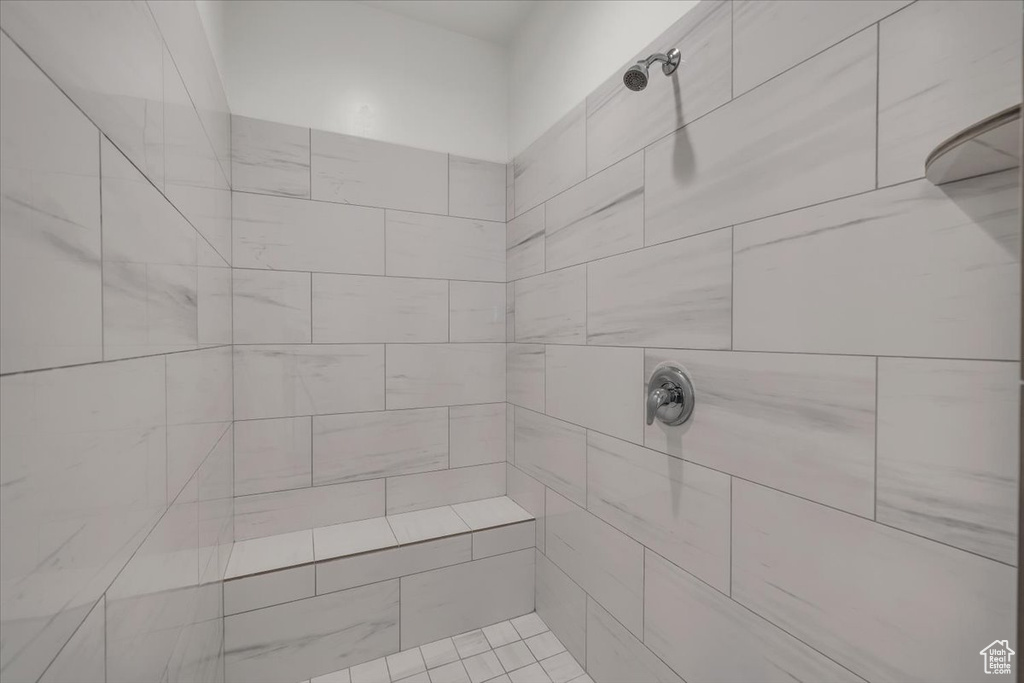 Bathroom with tiled shower